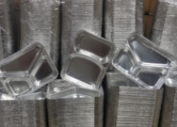 What are the problems with aluminum foil containers?